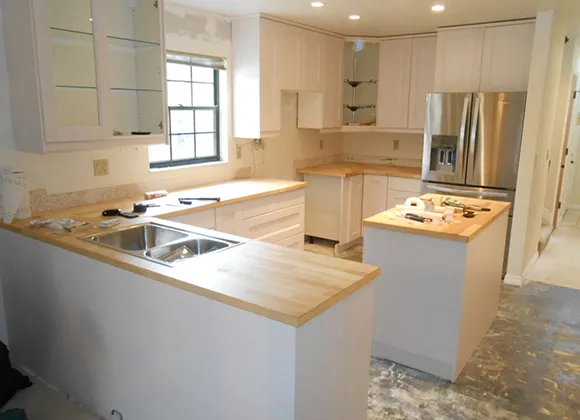 Custom cabinetry and refacing services enhance kitchen aesthetics and functionality with durable, stylish finishes.